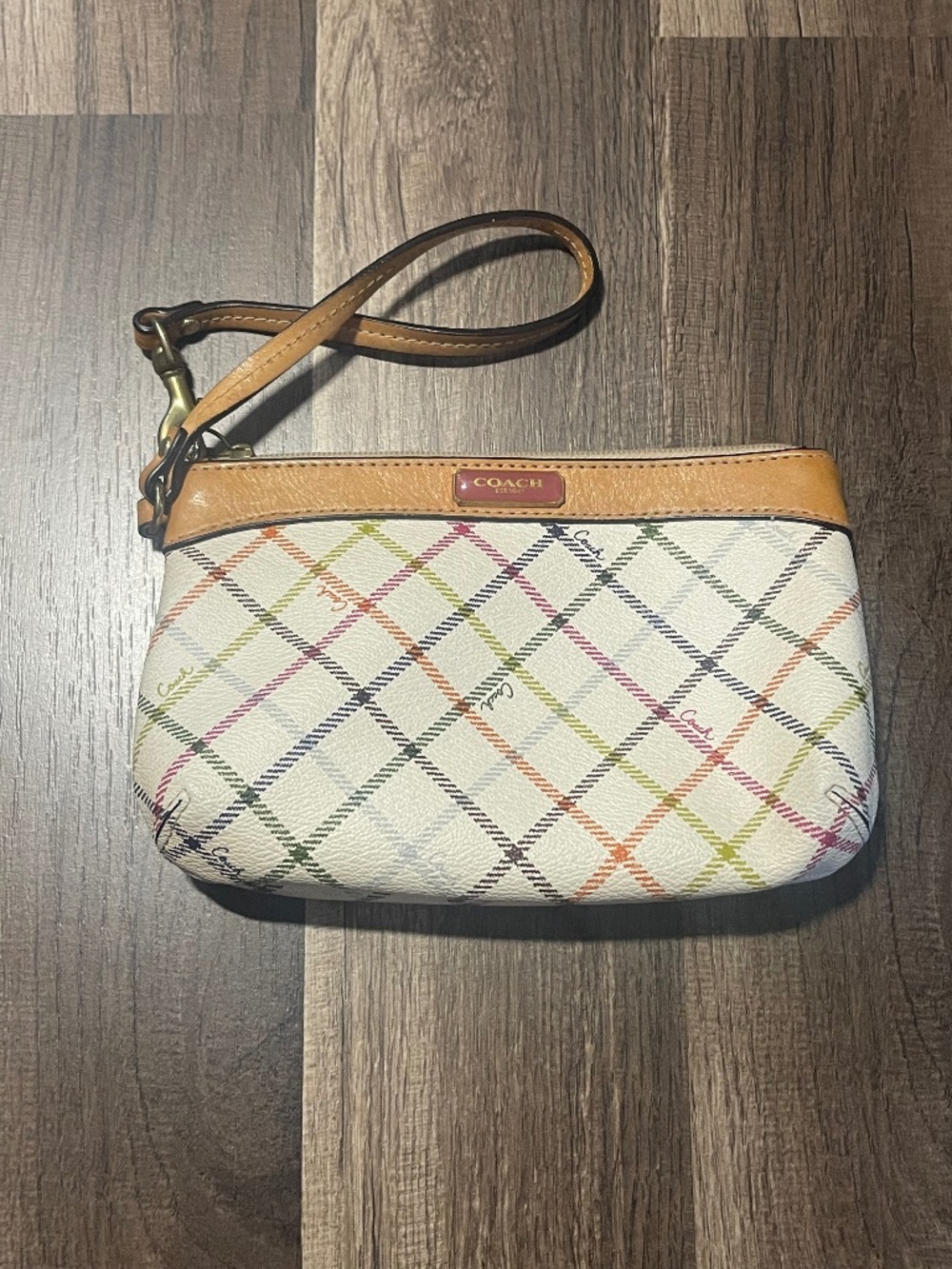 Coach cream-colored Peyton Tattersall multicolor plaid wristlet